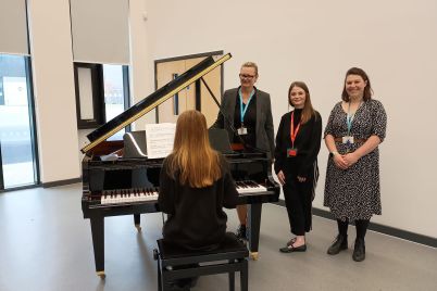 Cambourne-Village-College-Principal-Mrs-Lynn-Mayes-and-Dr-Athena-Bell-Deputy-Head-of-Sixth-Form-and-Head-of-Music-pictured-with-Taylor-Wimpey-East-Anglia-Head-of-Sales-Olivia-Peters-.jpeg